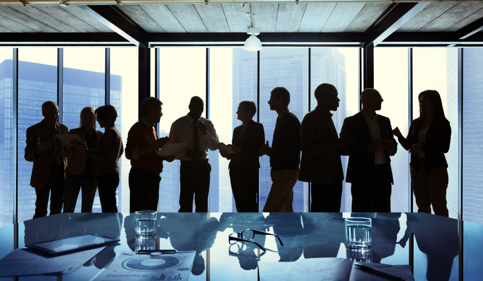 Group of Business Talking in a Meeting